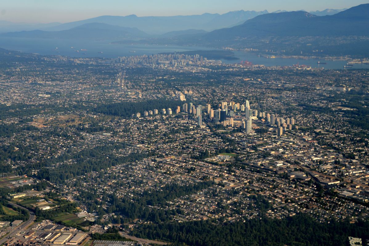 05 Vancouver Stretches To Downtown And Mountains Beyond From Airplane